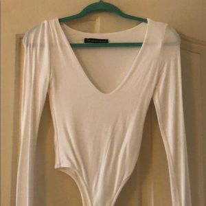 Naked wardrobe white v neck body suit